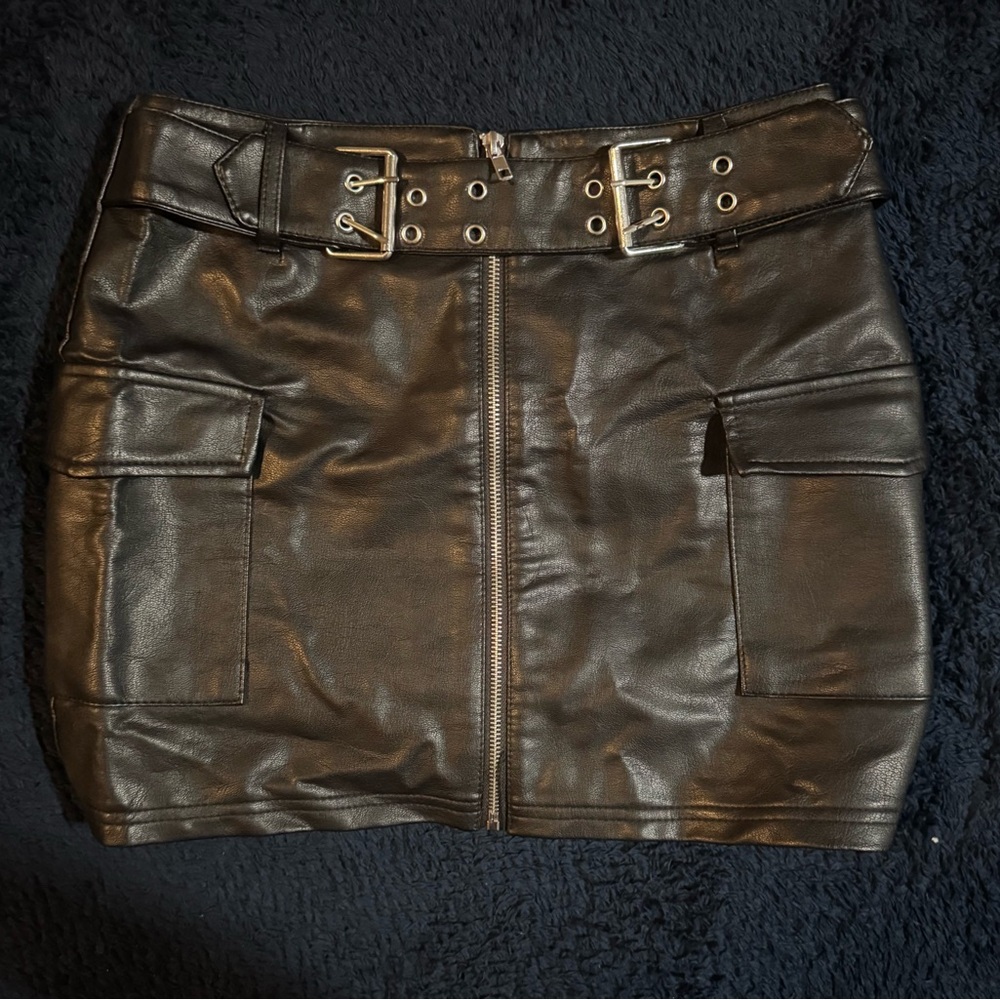 Sleek Black Mini Skirt with Double Buckle Detail